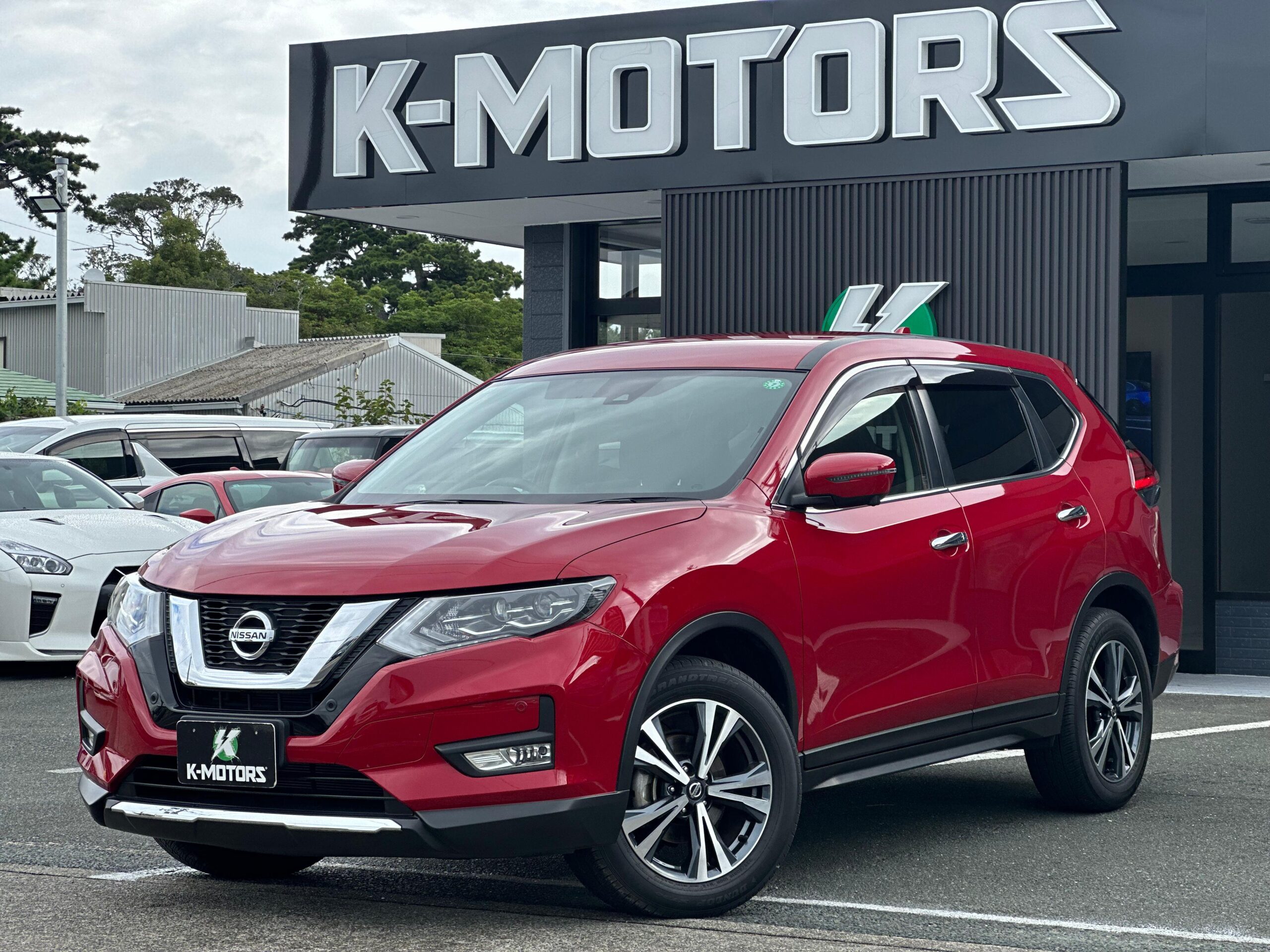 X trail vermelho